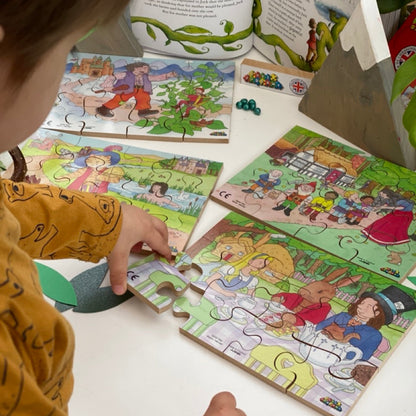 Child playing with a colorful puzzle on a table