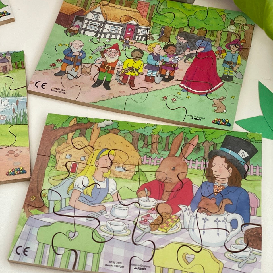 Children's puzzles with cartoon characters on a white surface