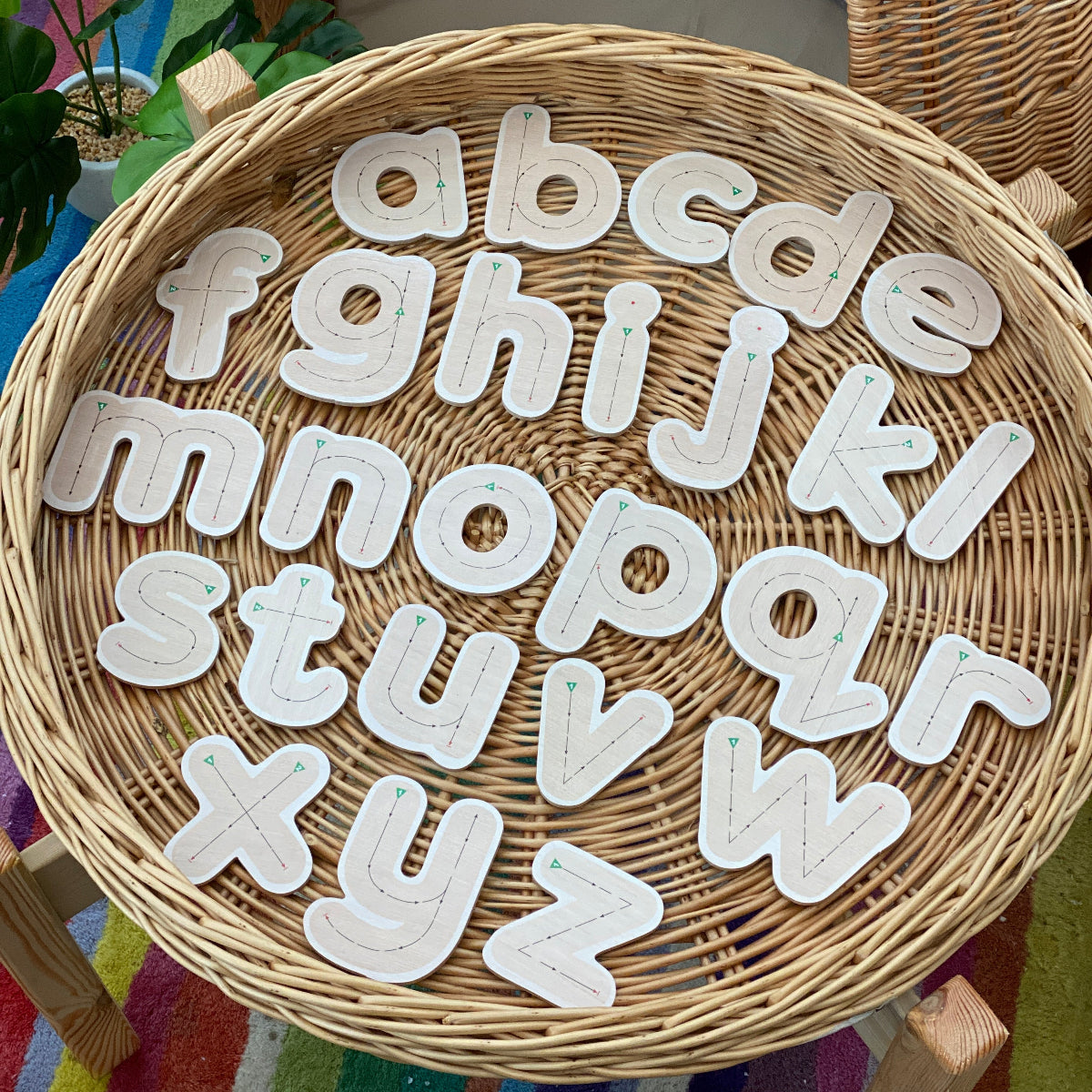 Wicker basket with letter formation pieces A- Z to practice writing letters and their forms