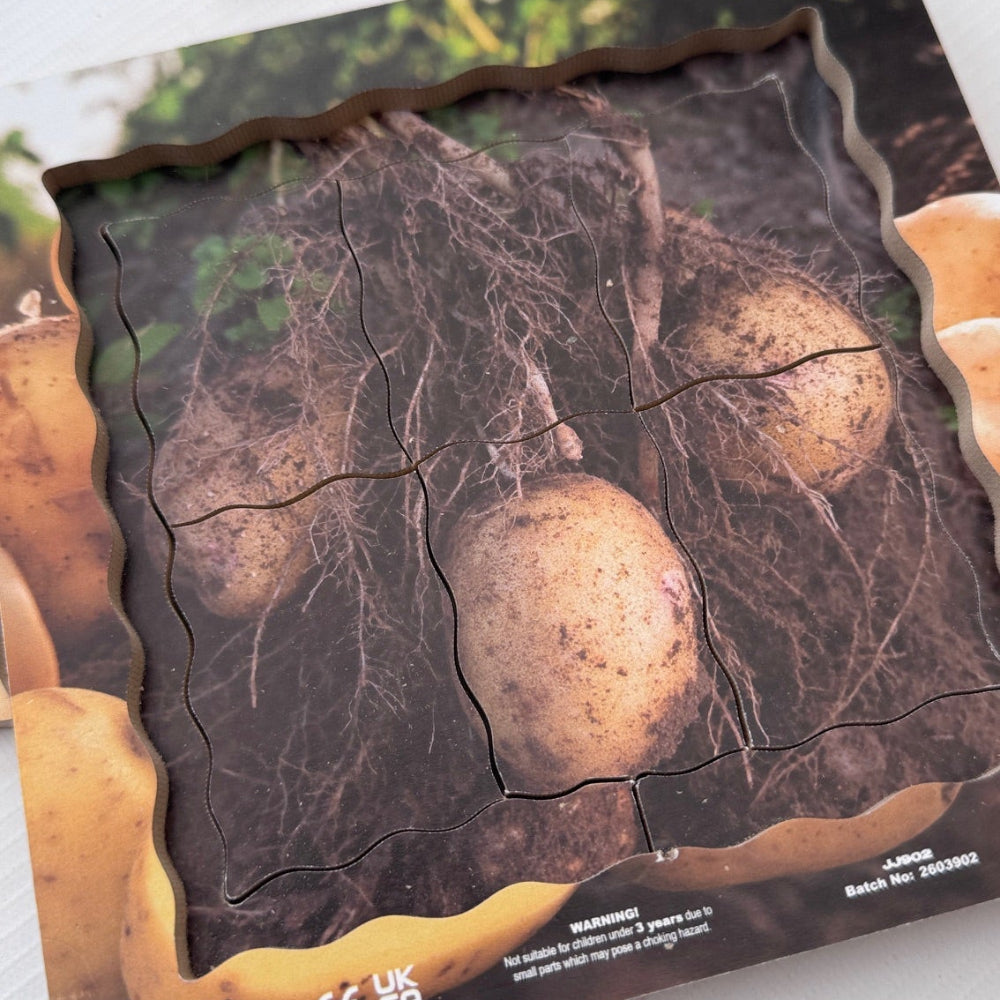 Jigsaw puzzle with potato design on a white background