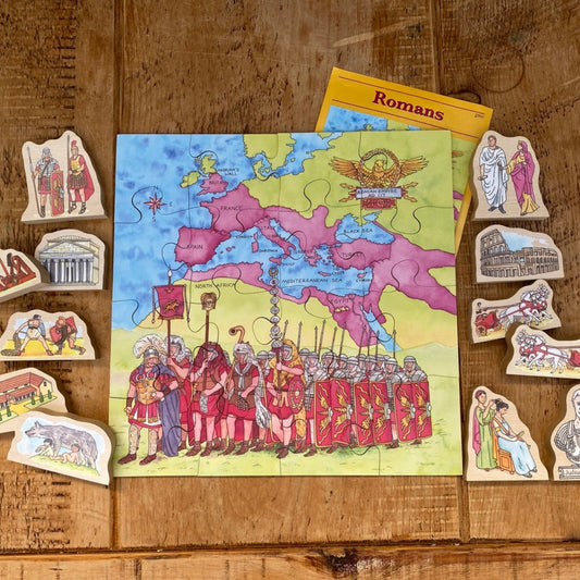 Educational Roman history set with map and figures on a wooden surface